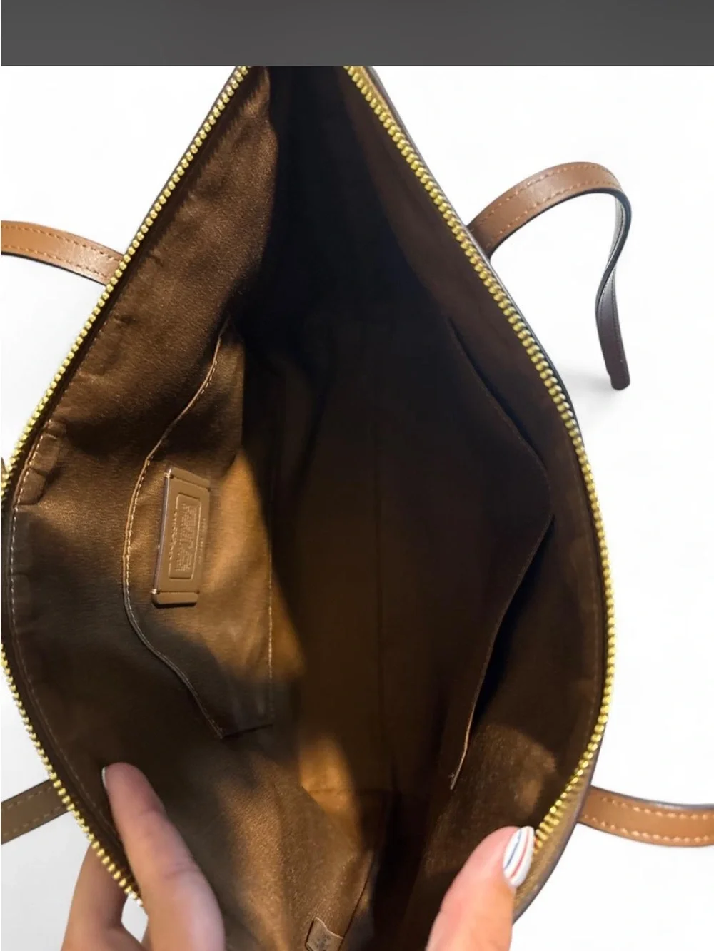Coach NWT Signature Canvas Zip Top Tote Bag in the color Khaki/Saddle